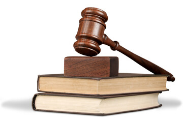 Books and wooden gavel on table. Justice concept