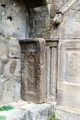 Armenia, Tatev, September 2022. Ancient khachkar near the wall of the main temple.