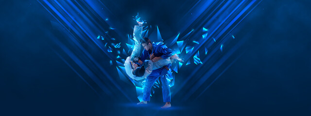 Creative artwork. Men, professional martial arts athletes training over dark blue background with...