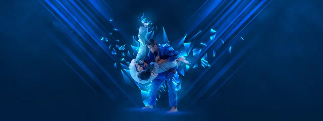 Fotobehang Creative artwork. Men, professional martial arts athletes training over dark blue background with polygonal and fluid neon elements. © Lustre