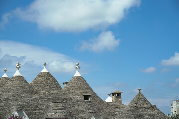 Fototapeta na wymiar Beautiful panorama with cone roofs of the fabulous village of Alberobello - Italy