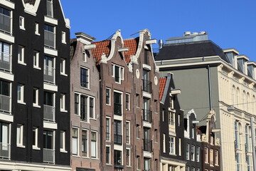 Amsterdam Nieuwezijds Voorburgwal Street Historic House Facades with Various Gables View, Netherlands