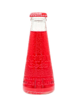 ROME, ITALY - OCTOBER 21, 2022. Campari soda mini bottle isolated on white background. Campari Soda is a pre-mixed drink made by Campari for the Italian market.
