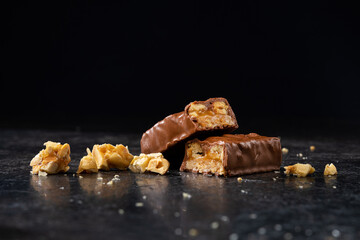 Sweet chocolate bar caramel with nuts and peanuts