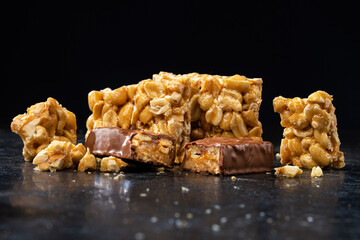Sweet chocolate bar caramel with nuts and peanuts