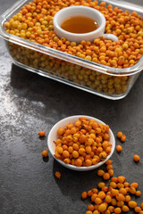 Sea buckthorn tea in a white cup.