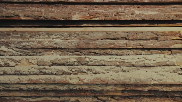 Wood factory stock and lumber board with nature business export the camera moves forward slow motion. Wood texture. Wood processing joinery work wooden furniture. Wood timber construction material. 