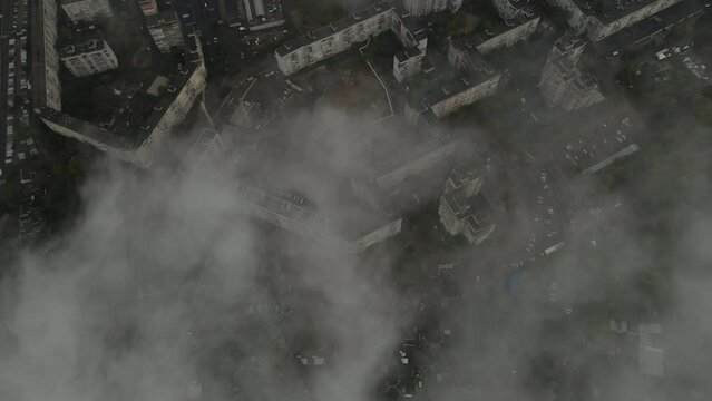 aerial view of civil district in ukrainian city under clouds at wet cold autumn day. winter and cold coming. energy and heating troubles because of war and russian invasion