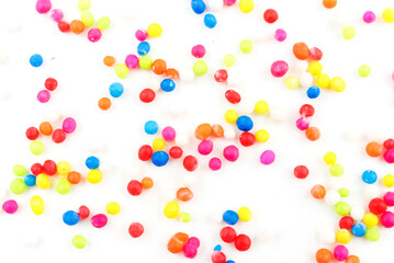 Fototapeta premium Rainbow sugar on white background