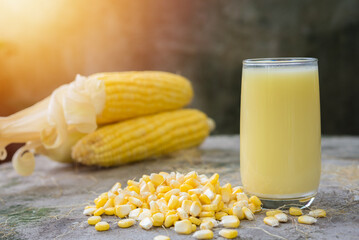 Yellow Sweet corn drink on wood  background , Yellow Corn juice, sweet corn milk, healthy organic food, bio nutrition