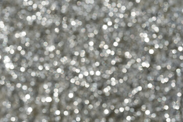 silver and white bokeh lights abstract background