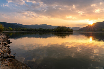 Beautiful sunset over the danube river from Visegrad Hungary with hills and rocks - obrazy, fototapety, plakaty