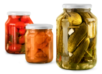 Jars with canned vegetables isolated on white