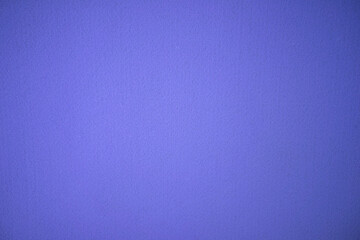 Photo of the texture of a purple felt fabric. Purple background for text. Sheet cut of fabric for production.