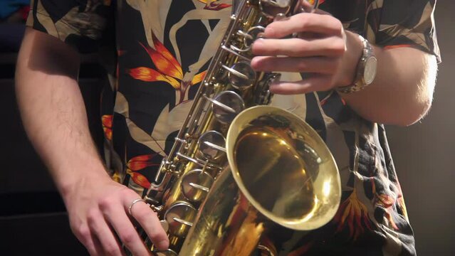 A Saxophonist Playing Saxophone in Recording Studio. Close Up. 4K Resolution.