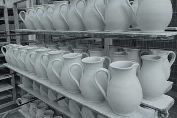 shelves with ceramic water pitchers