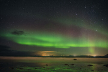 Fototapeta na wymiar The northern lights captured in the Lofoten Islands in northern Norway.