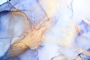 Alcohol ink abstract background. Blue golden luxury acrylic paint in water. Texture of marble....