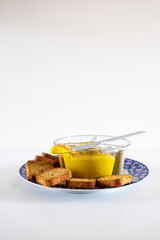 Slice of bread with fresh hummus dip