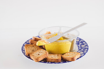 Slice of bread with fresh hummus dip