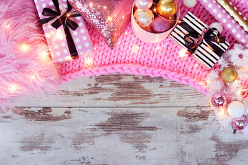 Still life in pink and gold colors with Christmas decoration