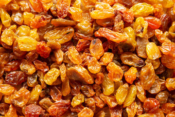 Organic Dried Raisins Background, top view. Flat lay, overhead.