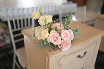 New wedding decoration with multi floral concept indoors. Wedding Ceremony, or wedding receptions. Family intimacy wedding dinner. 