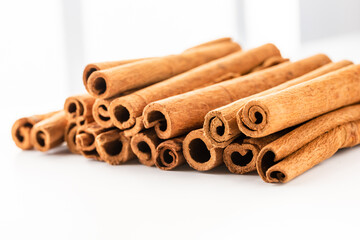 Cinnamon sticks isolated on white background.
