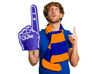 Young caucasian sports fan man isolated on white background pointing upside with opened mouth.