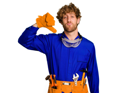 Young caucasian electrician man isolated on white background showing a dislike gesture, thumbs down. Disagreement concept. - Powered by Adobe