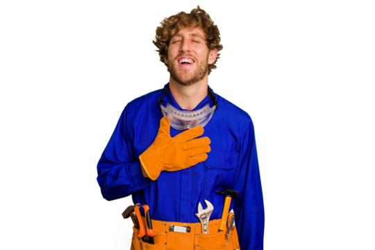 Young caucasian electrician man isolated on white background laughs out loudly keeping hand on chest.