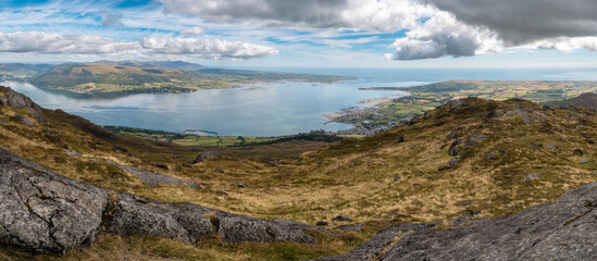 Panoramic photo of Slieve Donard slieve Bearnagh and Slieve Binnian  Mountains Carlingford Lough Louth Ireland.