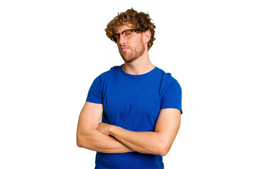Obraz premium Young caucasian man isolated on green chroma background unhappy looking in camera with sarcastic expression.