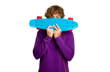 Young skater caucasian man isolated on white background