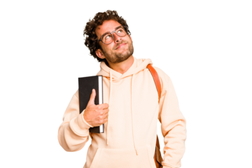 Young caucasian student man isolated dreaming of achieving goals and purposes