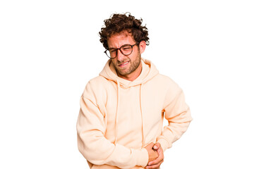 Young caucasian curly hair man isolated Young caucasian man with curly hair isolated having a liver...