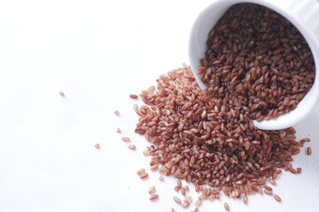 red rice in a bowl on table , haradighi rice 