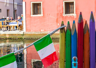 Fototapeta na wymiar Chioggia glimpse from the arcades along the canals - Chioggia city, Venetian Lagoon, Verona province, Italy – october 30, 2021