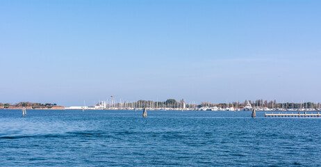 Fototapeta na wymiar Chioggia harbour. Entrance to the Venetian Lagoon, Veneto region, northern Italy