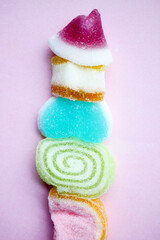 detail shot of sweet jelly on pink background 