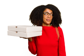 Young student african american woman holding pizzas on isolated confused, feels doubtful and unsure.