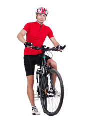 Fototapeta premium Standing cyclist holding his leg on a pedal