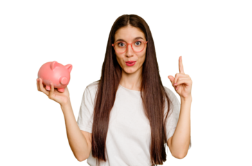 Young caucasian woman holding a piggy bank isolated having an idea, inspiration concept.