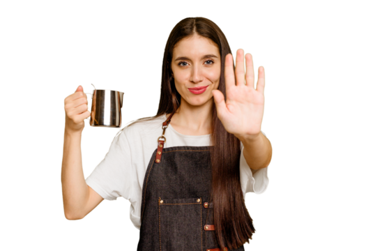 Young barista caucasian woman isolated standing with outstretched hand showing stop sign, preventing you.