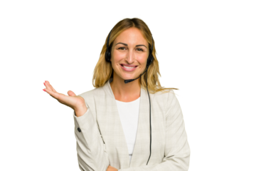 Telemarketer caucasian woman working with a headset isolated on green chroma background showing a copy space on a palm and holding another hand on waist.