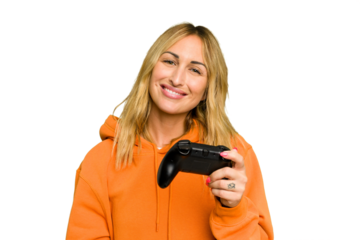 Young caucasian gamer woman holding a game controller isolated on green chroma background happy, smiling and cheerful.