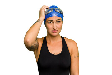 Young caucasian swimmer woman isolated on green chroma background being shocked, she has remembered...