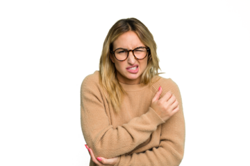 Young caucasian woman isolated on green chroma background massaging elbow, suffering after a bad movement.