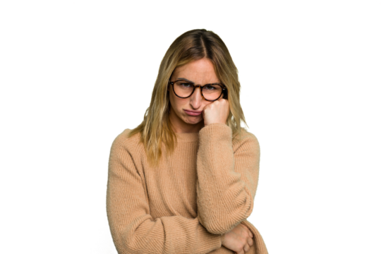 Young caucasian woman isolated on green chroma background who feels sad and pensive, looking at copy space.