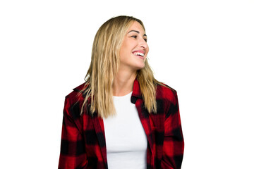 Young caucasian woman isolated on green chroma background relaxed and happy laughing, neck stretched showing teeth.